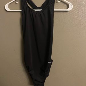 Woman’s black one piece bathing suit